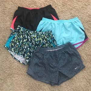 FOUR pairs of size medium Nike Shorts!